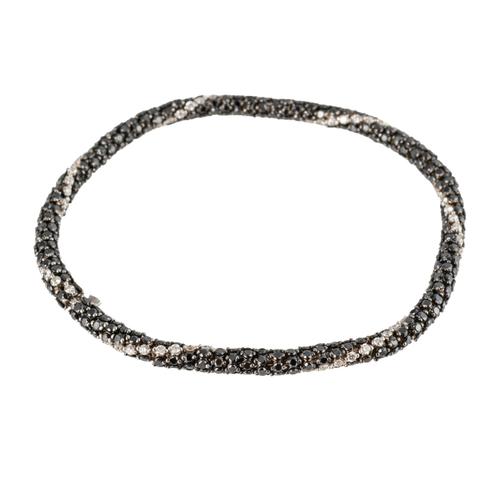 A BLACK AND COLOURLESS DIAMOND BRACELET
