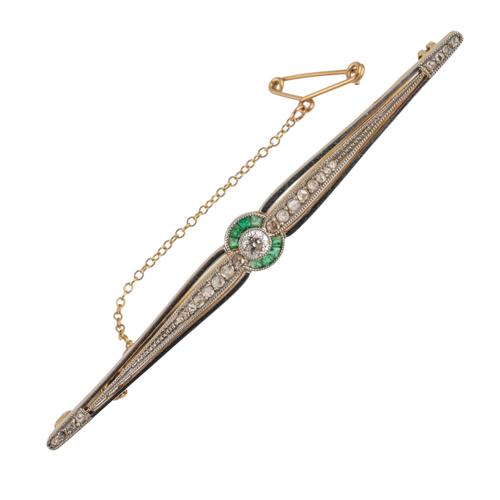AN EMERALD AND DIAMOND BROOCH