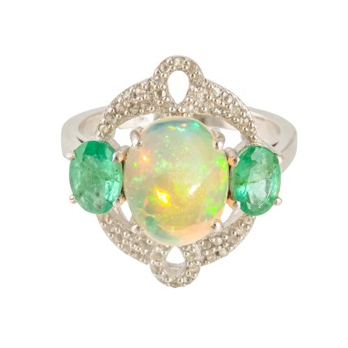 A SILVER OPAL, DIAMOND AND EMERALD RING