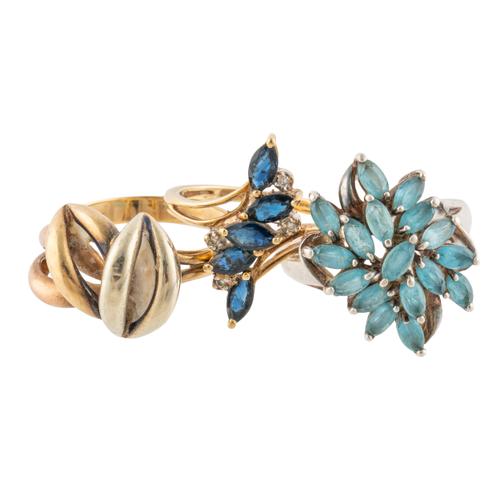 TWO GOLD RINGS AND A SILVER RING