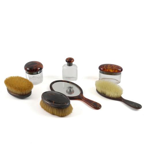 THREE SILVER AND TORTOISESHELL MOUNTED GLASS TOILET JARS AND A BOTTLE  AND FOUR FURTHER ITEMS (7)