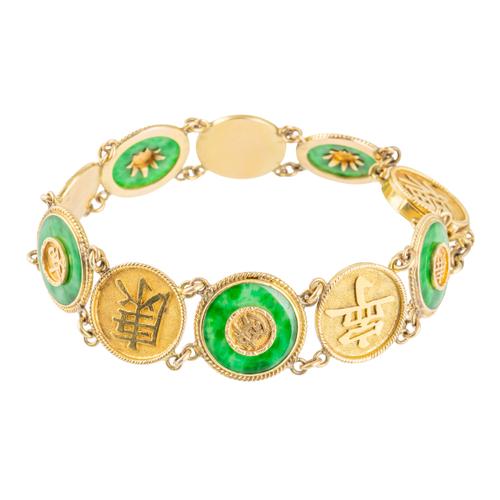 A JADE AND GOLD BRACELET