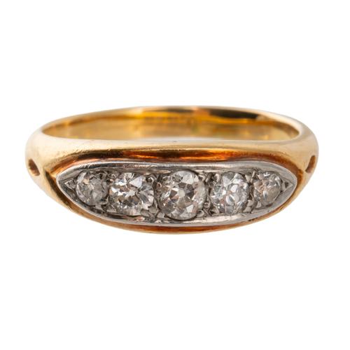 A GOLD AND DIAMOND FIVE STONE RING