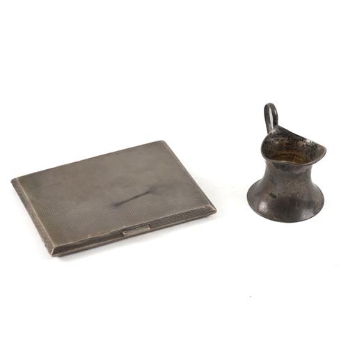 A SILVER CIGARETTE CASE AND A SMALL SILVER CREAM JUG (2)