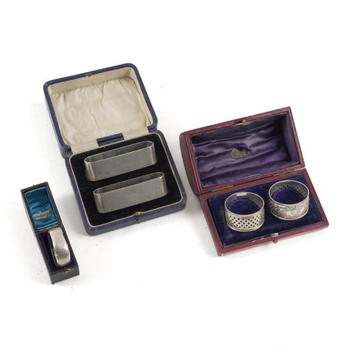 A GROUP OF NAPKIN RINGS (3)