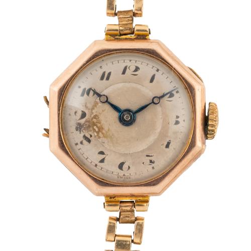 A 9CT GOLD LADY'S BRACELET WATCH