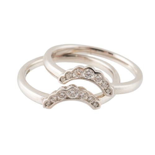 TWO SIMILAR 18CT WHITE GOLD AND DIAMOND SEVEN STONE RINGS (2)