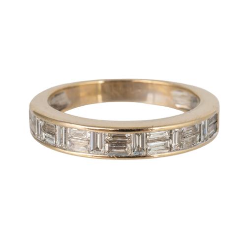 A GOLD AND BAGUETTE DIAMOND HALF HOOP RING