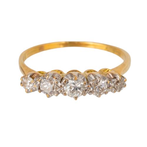 A GOLD AND DIAMOND FIVE STONE RING