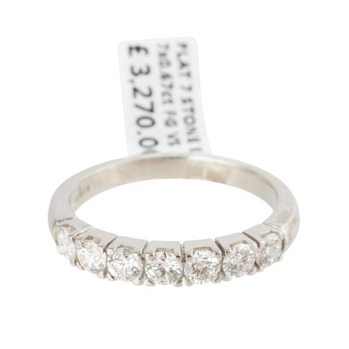 A ROUND BRILLIANT CUT DIAMOND HALF ETERNITY RING