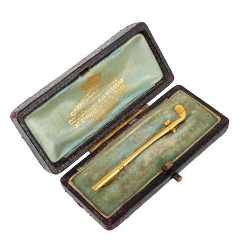 A GOLD GOLFING PIN (2)