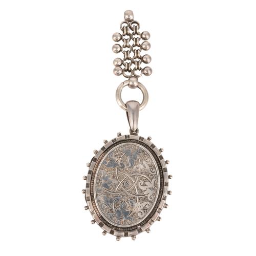 A SILVER VICTORIAN LOCKET