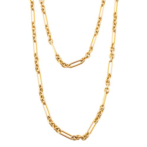A 15CT GOLD LONG FIGARO CHAIN WITH SWIVEL CLASP
