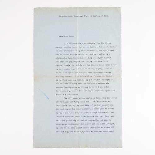 "DINESEN, Isak" [i.e. Karen BLIXEN (1885-1962)]. A typed letter in Swedish, signed ("Karen Blixen"), on blue paper, to "Mrs Shou", two-pages, dated 2 September 1938, thanking her very warmly for her letter about her African farm and "Out of Africa".