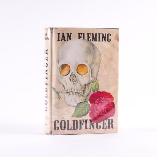 FLEMING, Ian (1908-64). Goldfinger, New York, 1959, 8vo, half title (a few pages with light stains and spots), original black cloth with skull design stamped in blind with gold coins as eyes, dust-jacket. FIRST AMERICAN EDITION. Gilbert A7b.