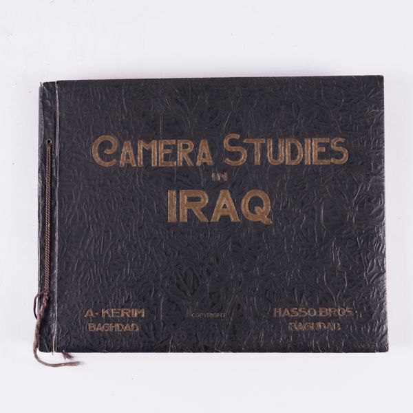 PHOTOGRAPHY, IRAQ - [Title stamped in gilt on the upper cover:] Camera Studies in Iraq, Baghdad, A. Kerim & Hasso Bros., [c.1925], oblong 4to, 50 photographed plates, original padded album. RARE.