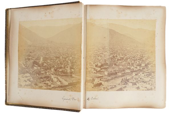 PHOTOGRAPH ALBUM, THE SECOND ANGLO-AFGHAN WAR - An album of 25 FINE mounted albumen silver print photographed views, with a few other unrelated photographs, in a morocco gilt 4to album, [c.1879-80]. With a related printed work in 2 vols. (3)