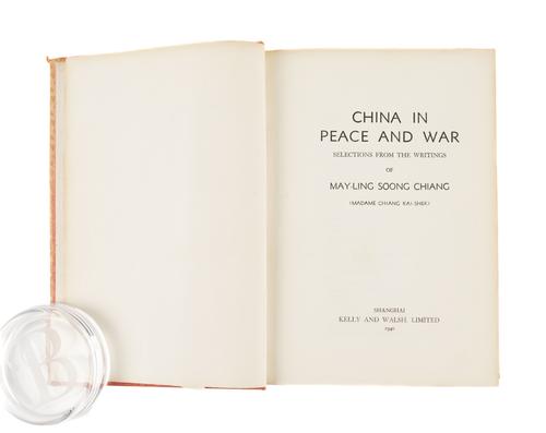 SOONG MEI-LING ("Madame CHIANG") (1898-2003). China in Peace and War, Shanghai, 1940, large 8vo, original pink silk boards gilt. FIRST EDITION. "This book has been printed on specially prepared Chinese paper made by hand from bamboo fiber" (printed note).