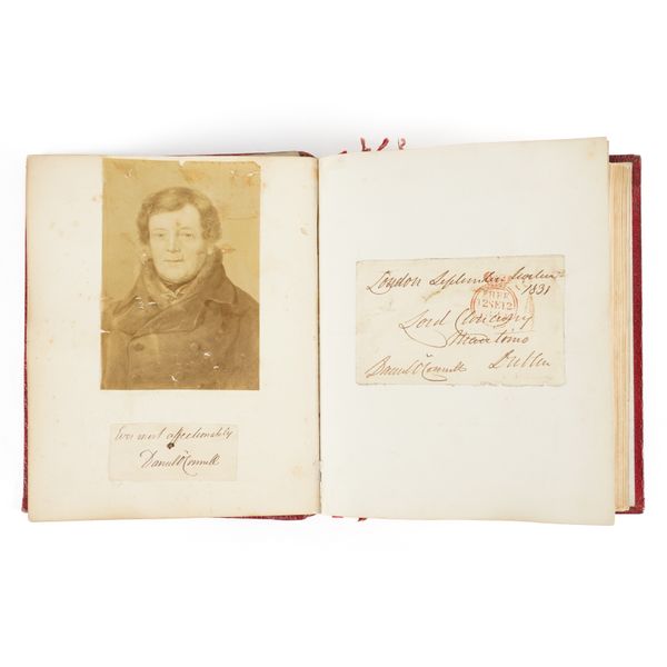 ALBUM, MAINLY OF IRISH INTEREST - A collection of autograph letters, clipped signatures etc. by Daniel O'Connell, John O'Connell, William O'Brien, Thomas Henry Huxley, Disraeli, Tennyson, Ruskin, etc. Please see the full description below.