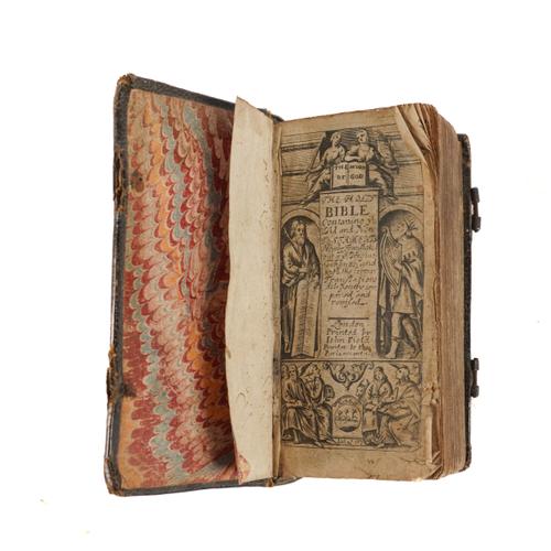 BIBLE, in English - The Holy Bible, London, "Printed by John Field, Printer to the Parliament", 1653, tall 24mo, engraved title, contemporary calf with a design of tendrils and flowerheads and initials "F. P." stamped on each cover (rubbed, lacks clasps).