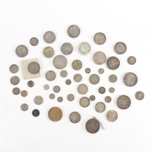 A GROUP OF MOSTLY SILVER FOREIGN COINS
