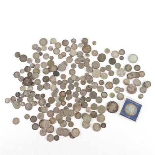 A LARGE QUANTITY OF MOSTLY SILVER COINS OF THE WORLD