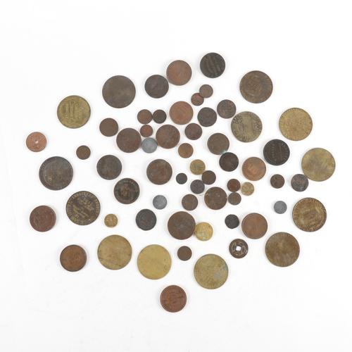 A GROUP OF FOREIGN COINS AND TOKENS