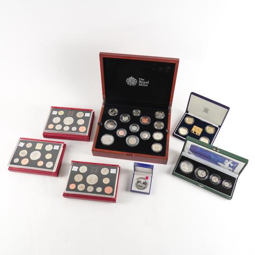 A GROUP OF MOSTLY ROYAL MINT COINS AND ALSO A MEDALLION
