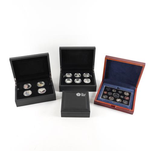 FOUR ROYAL MINT COMMEMORATIVE COIN SETS