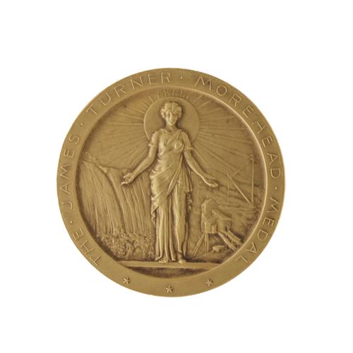 A TIFFANY AND CO GOLD MEDALLION