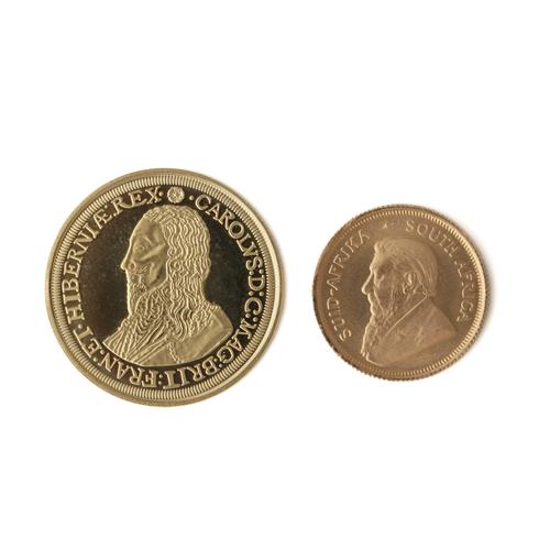 A GOLD MEDALLION AND A ONE TENTH KRUGERRAND (2)