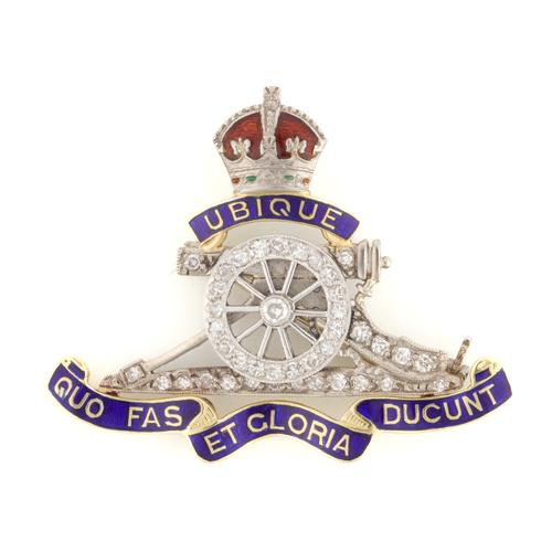 A GOLD, DIAMOND AND ENAMELLED BROOCH