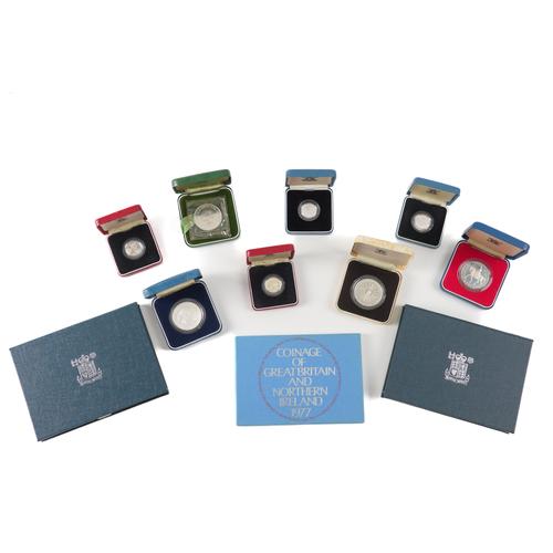 A GROUP OF BIRITISH PROOF COMMEMORATIVE COINAGE