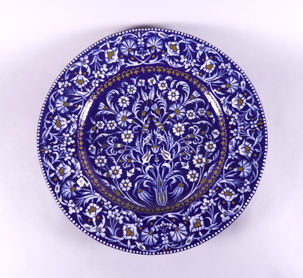 A LARGE FRENCH BLUE-GROUND EARTHENWARE CHARGER