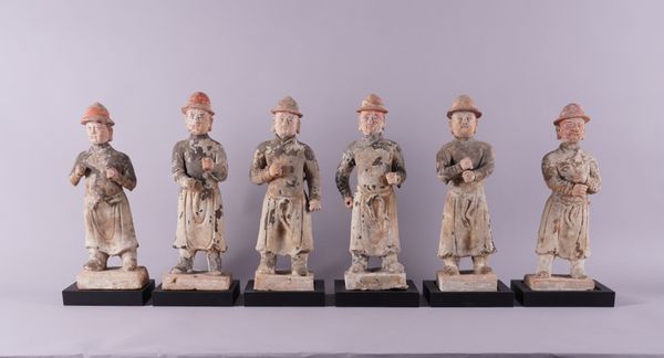 SIX CHINESE POTTERY FIGURES OF ATTENDANTS