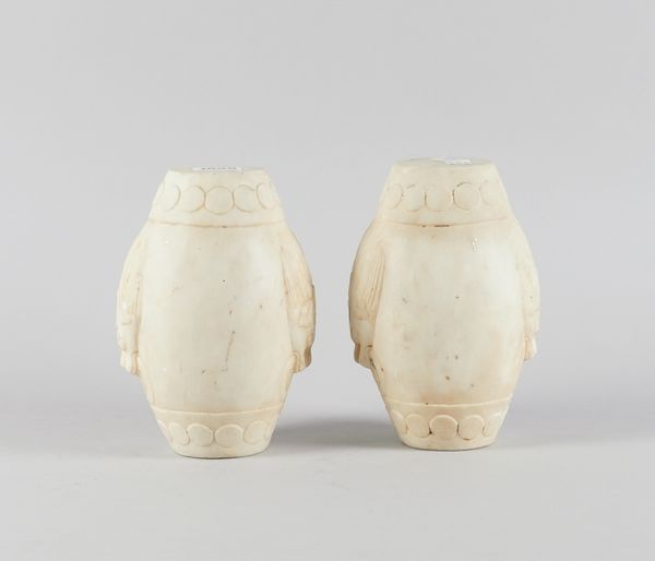 A PAIR OF CHINESE WHITE MARBLE STANDS (2)