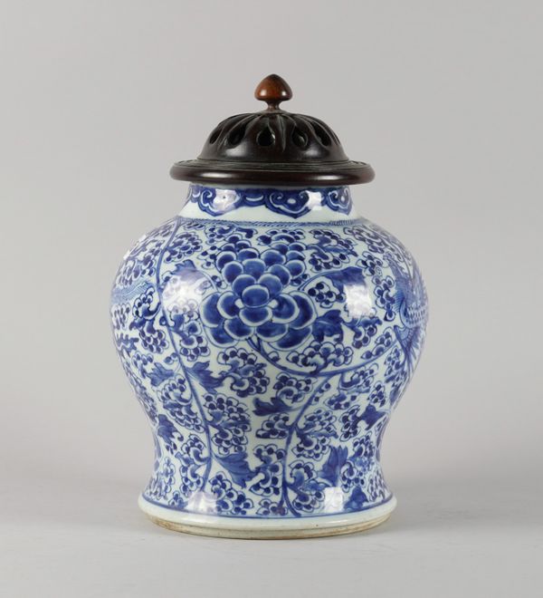 A CHINESE BLUE AND WHITE `PHOENIX' VASE