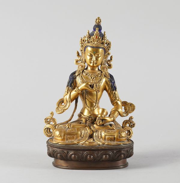 A GILT COPPER VAJRASATTVA BUDDHA