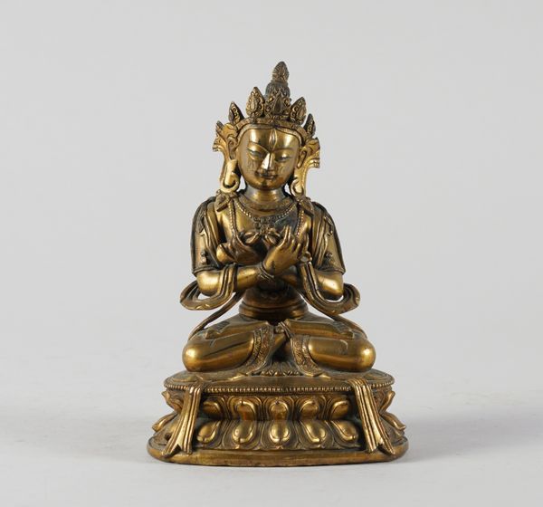 A SINO-TIBETAN GILT-BRONZE FIGURE OF VAJRADHARA