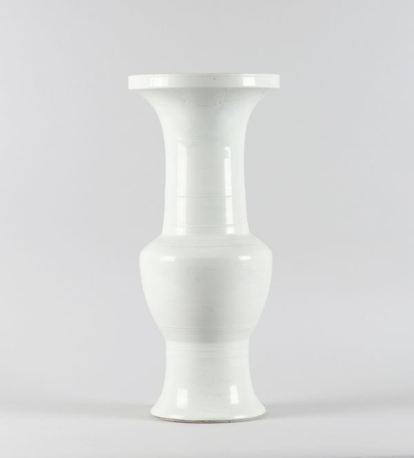 A CHINESE WHITE GLAZED `ANHUA' YEN YEN VASE