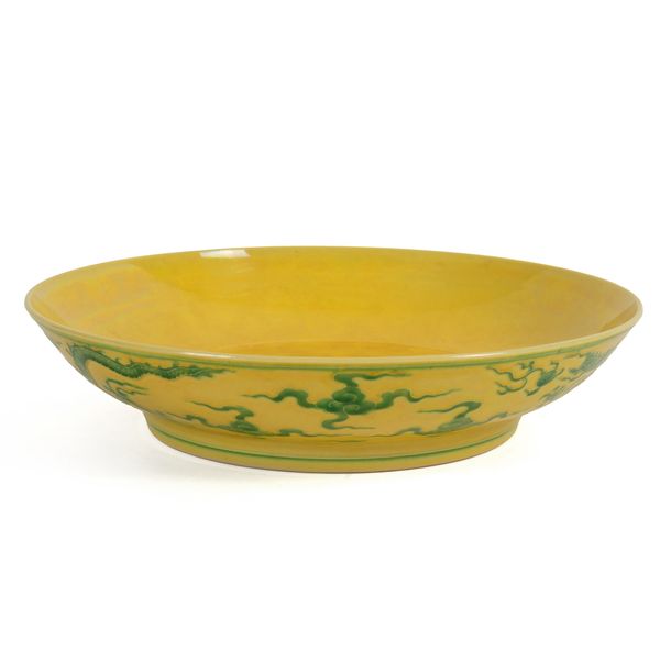 A CHINESE YELLOW-GROUND `DRAGON' DISH