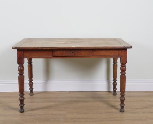 A 19TH CENTURY FRENCH FRUITWOOD KITCHEN TABLE