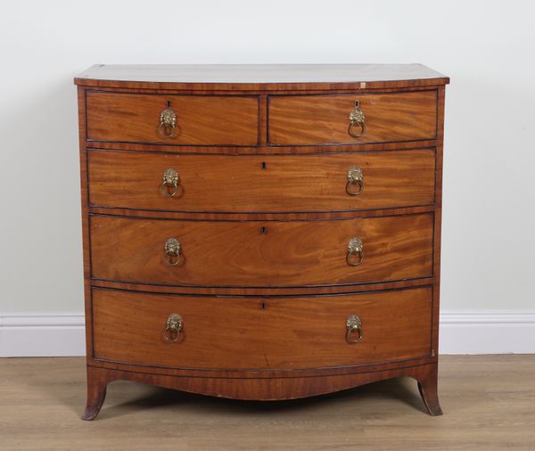 A REGENCY INLAID MAHOGANY BOW FRONT FIVE DRAWER CHEST