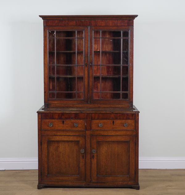 AN 18TH CENTURY OAK BOOKCASE CABINET