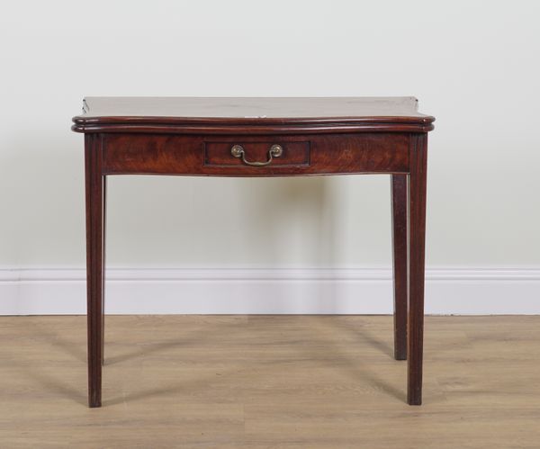 A MID-18TH CENTURY MAHOGANY SERPENTINE FOLDOVER TEA TABLE