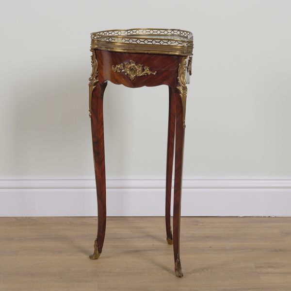 A LOUIS XV STYLE GILT METAL MOUNTED MARBLE TOPPED SHAPED OCCASIONAL TABLE