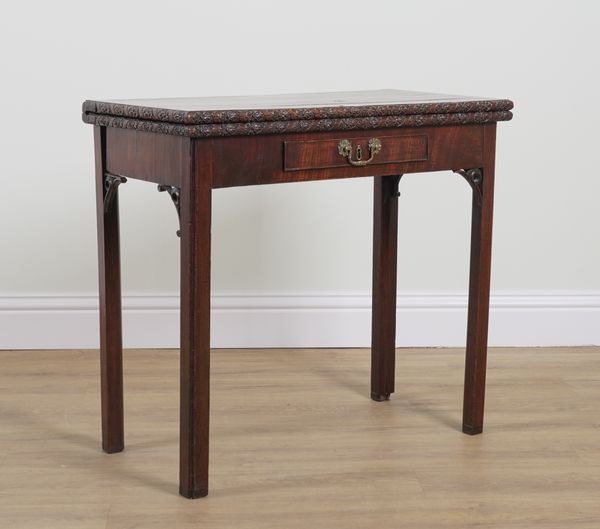 A GEORGE II RECTANGILAR MAHOGANY FOLDOVER CARD TABLE