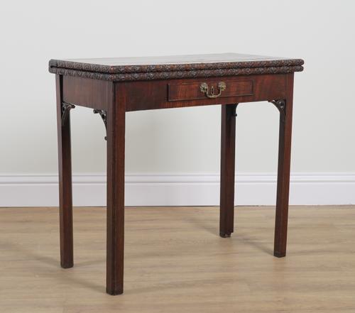A GEORGE II RECTANGILAR MAHOGANY FOLDOVER CARD TABLE