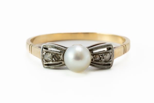 A GOLD, CULTURED PEARL AND DIAMOND RING