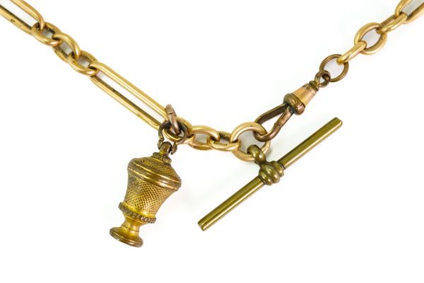 A 15CT GOLD BAR AND OVAL LINK WATCH ALBERT CHAIN